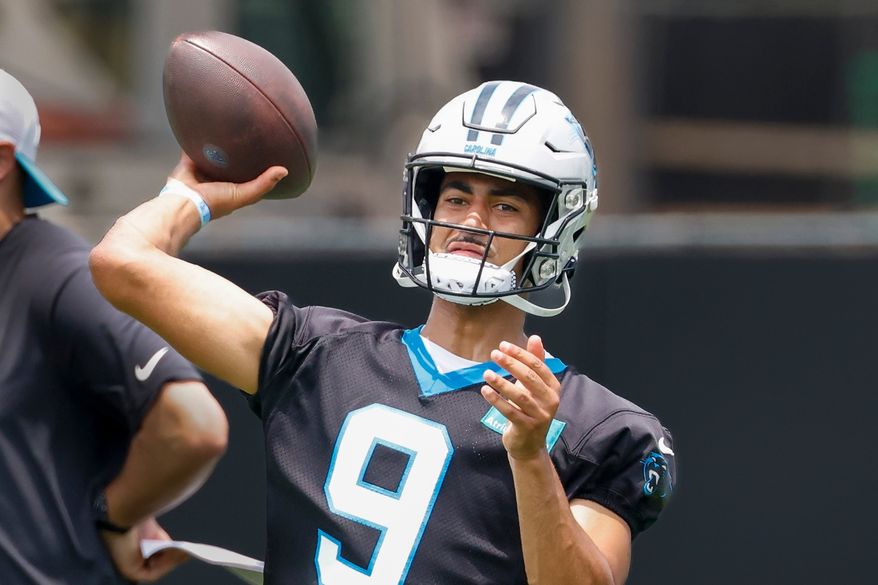 FILE - Carolina Panthers quarterback Bryce Young passes during the team's NFL football practice in Charlotte, N.C., Tuesday, June 9, 2026. (AP Photo/Nell Redmond, File)