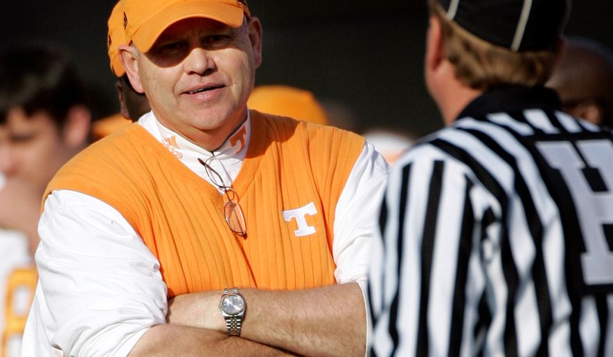 FILE - Tennessee head coach Phillip Fulmer questions a referee about a call in the fourth quarter of a college football game against Vanderbilt in Nashville, Tenn., on Nov. 18, 2006. (AP Photo/Mark Humphrey, File)