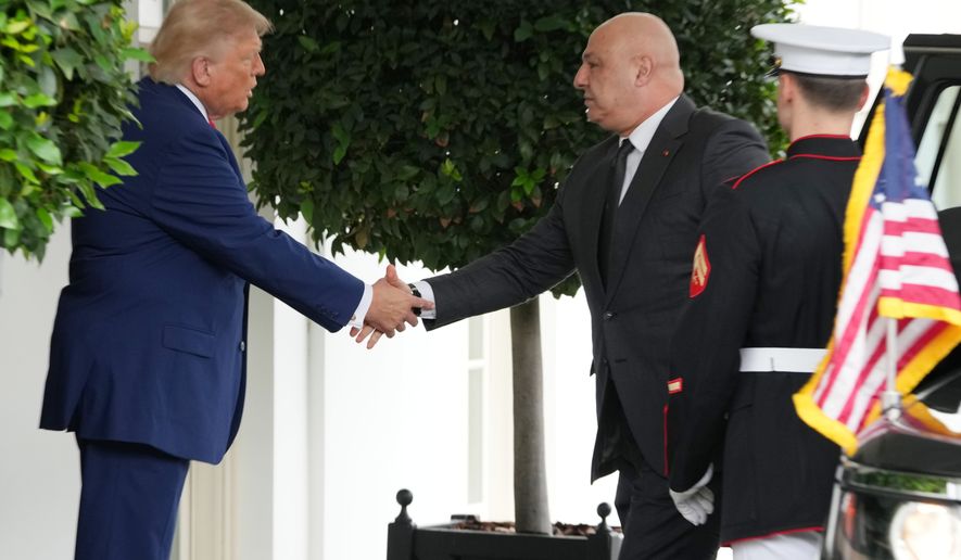 President Donald Trump greets Lebanese President Joseph Aoun on his arrival at the White House, Tuesday, July 21, 2026, in Washington. (AP Photo/Mark Schiefelbein)