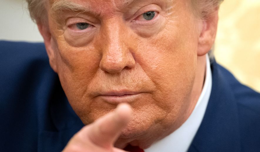 President Donald Trump gestures while meeting with Lebanese President Joseph Aoun in the Oval Office at the White House, Tuesday, July 21, 2026, in Washington. (AP Photo/Mark Schiefelbein)