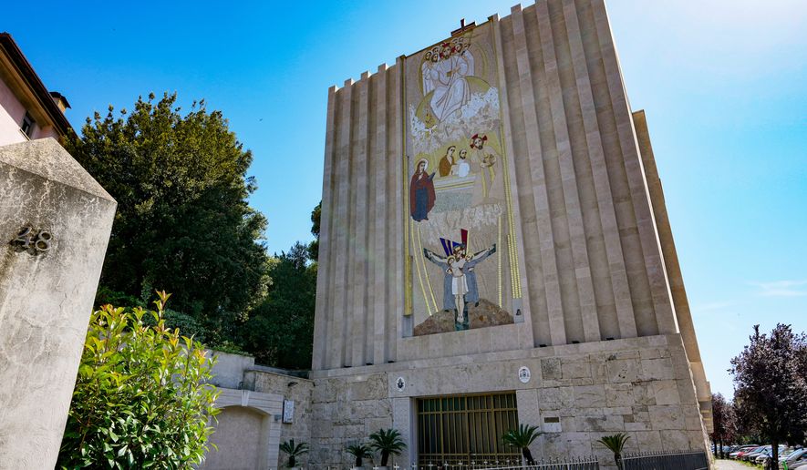 FILE - A mosaic by ex-Jesuit artist Marko Rupnik is seen on the main facade of the Church of Our Lady of the Canadian Martyrs, June 28, 2024, in Rome. (AP Photo/Andrew Medichini, File)