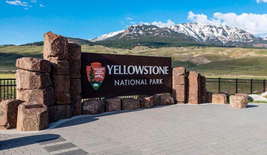 This photo provided by the National Park Service shows a sign marking the north entrance of Yellowstone National Park on May 7, 2018. (Jacob W. Frank/National Park Service via AP, File)