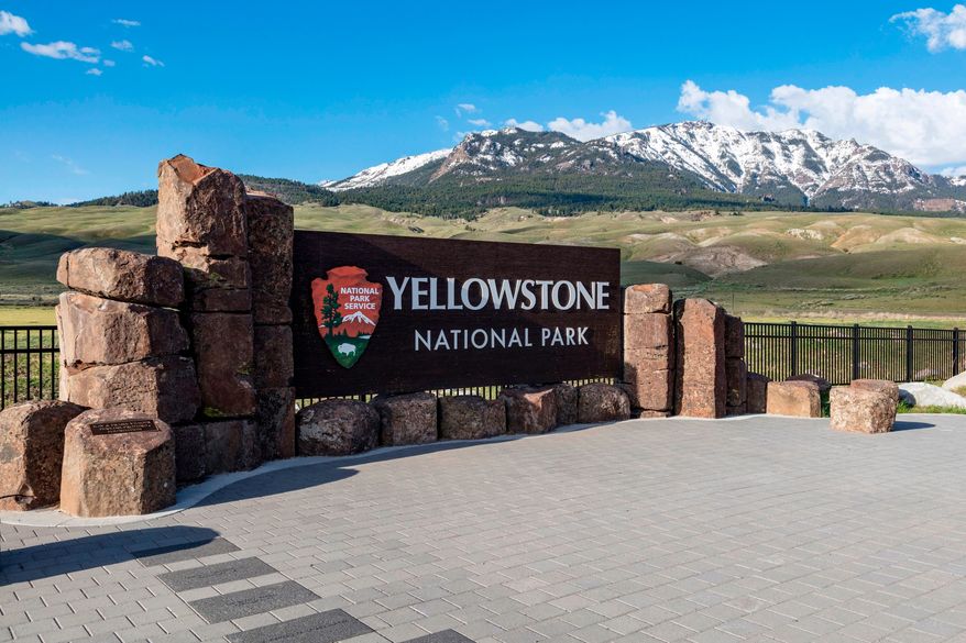 This photo provided by the National Park Service shows a sign marking the north entrance of Yellowstone National Park on May 7, 2018. (Jacob W. Frank/National Park Service via AP, File)