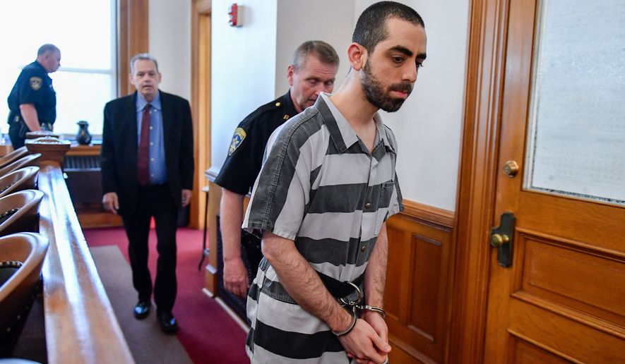 FILE - Hadi Matar walks in to the Chautauqua County court in Mayville, N.Y., May, 16, 2025. (AP Photo/Adrian Kraus, File)