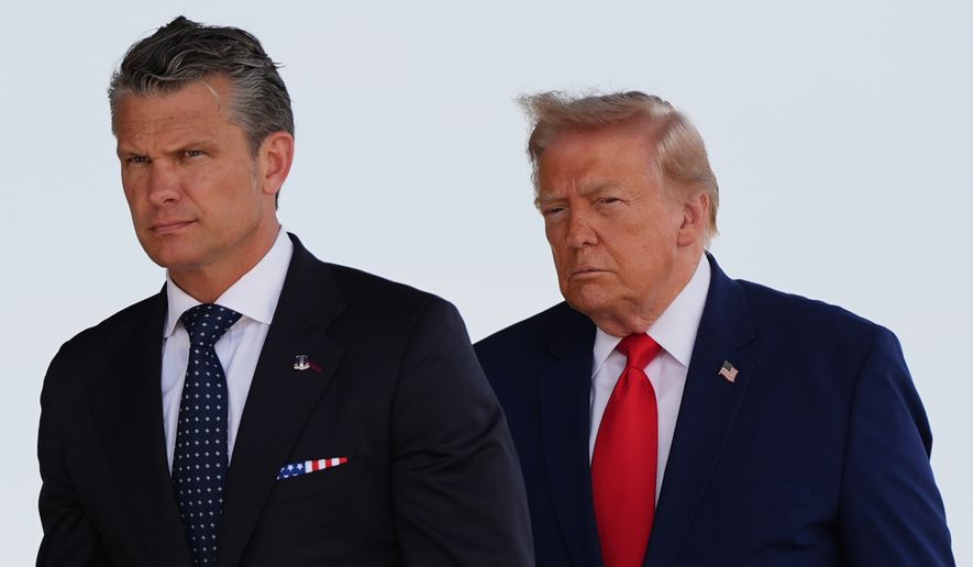 Defense Secretary Pete Hegseth and President Donald Trump attend the dignified transfer of four U.S. service members recently killed in the Middle East, Wednesday, July 22, 2026, at Dover Air Force Base, Del. (AP Photo/Julia Demaree Nikhinson)
