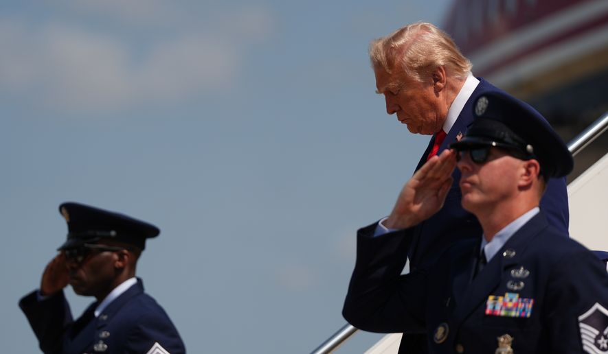 President Donald Trump disembarks Air Force One, Wednesday, July 22, 2026, at Dover Air Force Base, Del. (AP Photo/Julia Demaree Nikhinson)