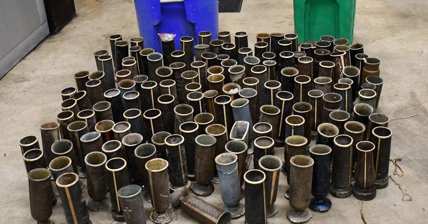 The Charles County Sheriff’s Office has arrested two men accused of taking over 100 bronze vases from a cemetery so they could be melted down. The 100 memorial vases, worth a total of more than $100,000, were taken at separate times from Trinity Memorial Gardens in Waldorf last month and earlier this month. On July 8, deputies noticed a van near the cemetery and upon following up found vases in trash cans, the sheriff’s office said on social media. (Photo courtesy of Charles County Sheriff's Office)