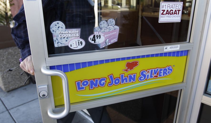 A customer enters a Long John Silver's restaurant in Mountain View, Calif., Tuesday, Jan. 18, 2011. Yum Brands Inc. is putting its Long John Silver's and A&W restaurant chains up for sale so it can focus on its growing international business. (AP Photo/Paul Sakuma)