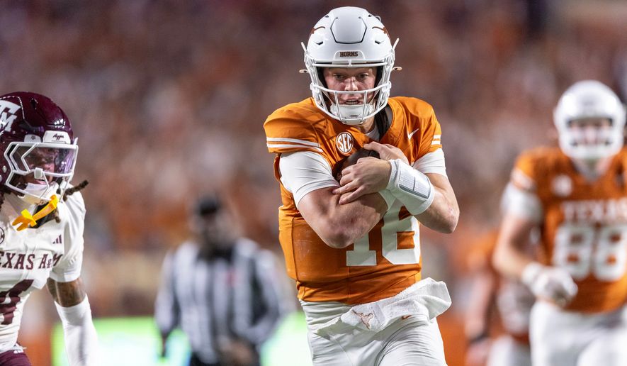 FILE - Texas quarterback Arch Manning (16) scores a touchdown past Texas A&M cornerback Will Lee III (4) during the second half of an NCAA college football game Friday, Nov. 28, 2025, in Austin, Texas. (AP Photo/Stephen Spillman, File)