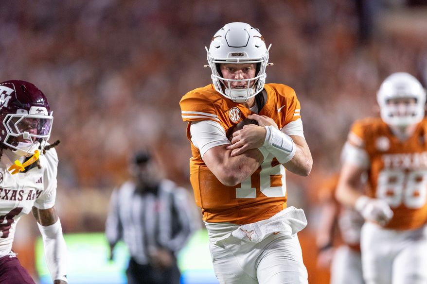 FILE - Texas quarterback Arch Manning (16) scores a touchdown past Texas A&M cornerback Will Lee III (4) during the second half of an NCAA college football game Friday, Nov. 28, 2025, in Austin, Texas. (AP Photo/Stephen Spillman, File)
