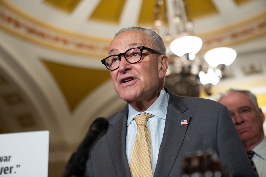 Senate Minority Leader Chuck Schumer, D-N.Y., speaks to reporters following a weekly policy luncheon at the Capitol in Washington, Tuesday, July 21, 2026. (AP Photo/Allison Robbert)
