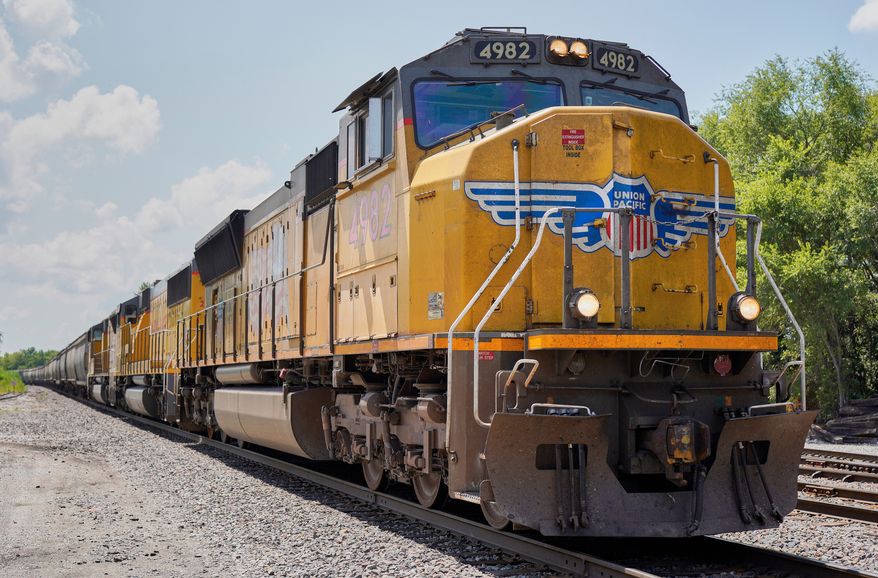 FILE - A Union Pacific train travels through Union, Neb., July 31, 2018. (AP Photo/Nati Harnik, File)