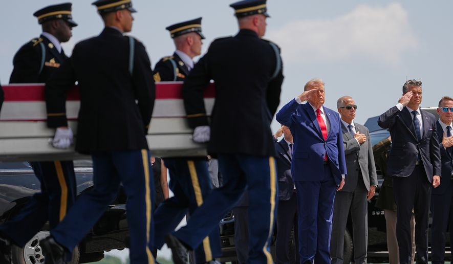 President Donald Trump and Secretary of Defense Pete Hegseth, salute as a U.S. Army carry team moves a transfer case containing the remains of Pvt. Isabella Gonzales of Carrollton, Texas, Wednesday, July 22, 2026, at Dover Air Force Base, Del. (AP Photo/Matt Rourke)