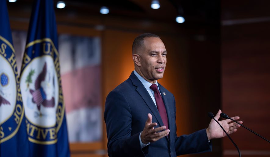 House Minority Leader Hakeem Jeffries, D-N.Y. speaks to reporters after the House narrowly passed a resolution to halt U.S. military action in Iran, at the Capitol in Washington, Thursday, July 23, 2026. (AP Photo/J. Scott Applewhite)