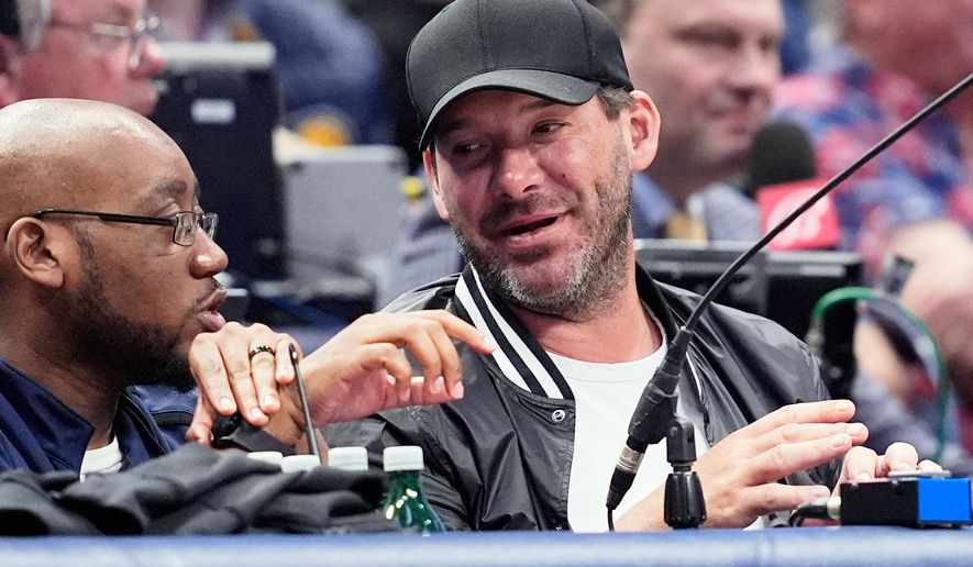 Former NFL quarterback Tony Romo, right, attends an NBA basketball game between the Indiana Pacers and the Dallas Mavericks on March 5, 2024, in Dallas. (AP Photo/Tony Gutierrez, File)