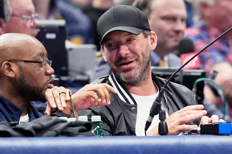 Former NFL quarterback Tony Romo, right, attends an NBA basketball game between the Indiana Pacers and the Dallas Mavericks on March 5, 2024, in Dallas. (AP Photo/Tony Gutierrez, File)