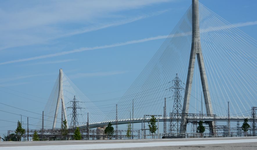 The Gordie Howe International bridge connects Detroit and Windsor, Ontario is shown Friday, July 24, 2026, in Windsor. (AP Photo/Paul Sancya)