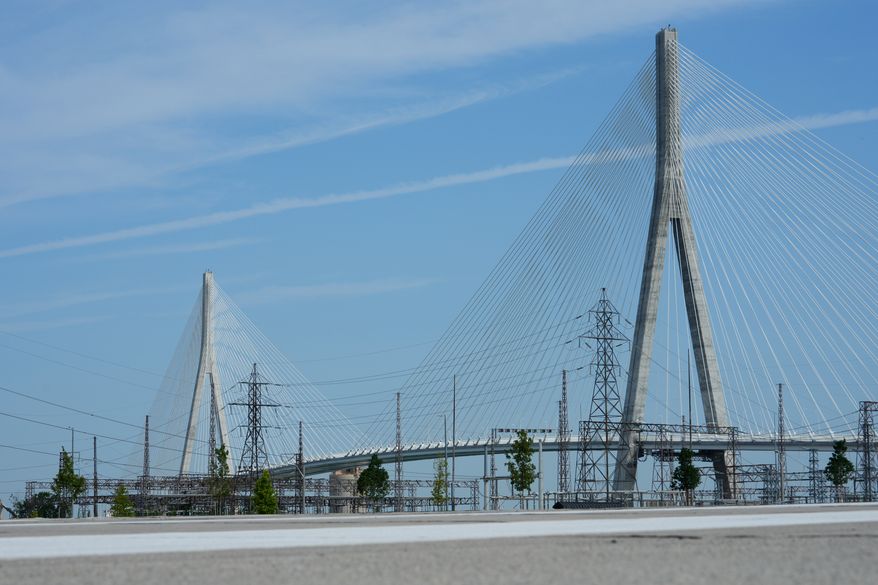 The Gordie Howe International bridge connects Detroit and Windsor, Ontario is shown Friday, July 24, 2026, in Windsor. (AP Photo/Paul Sancya)