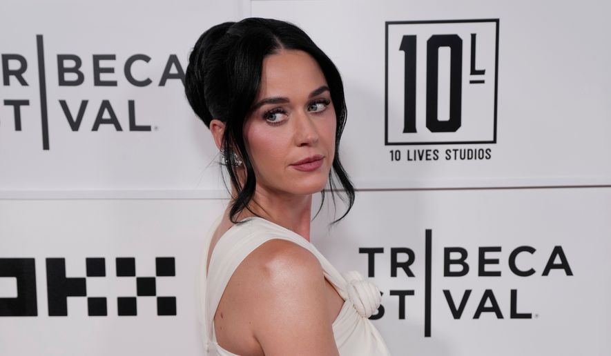 Katy Perry attends the "Katy Perry: The Lifetimes Tour - Live from Paris" world premiere at the OKX Theater at BMCC Tribeca Performing Arts Center during the Tribeca Festival on Monday, May 8, 2026, in New York. (Photo by Charles Sykes/Invision/AP)
