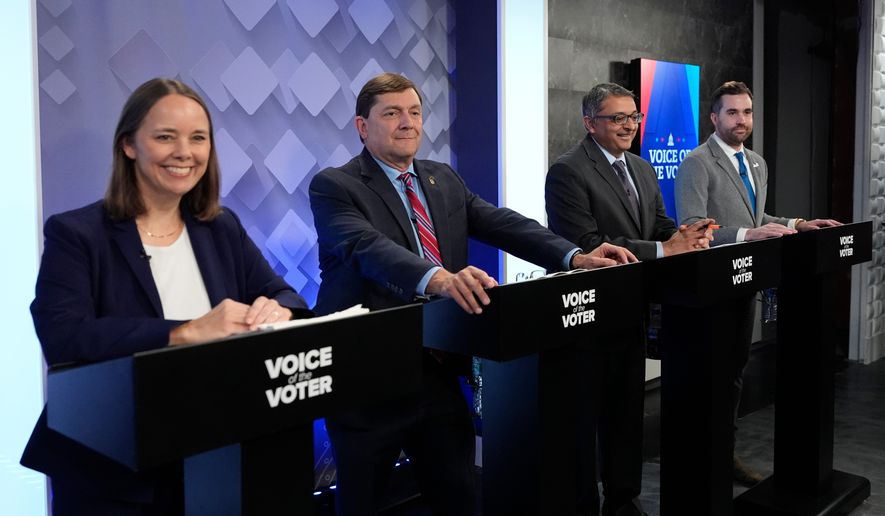 From left, U.S. Senate candidates Shenna Bellows, Troy Jackson, Dr. Nirav Shah, and Jordan Wood prepare for their televised debate at the WCSH-6 studio Thursday, July 16, 2026, in Portland, Maine. (AP Photo/Robert F. Bukaty)