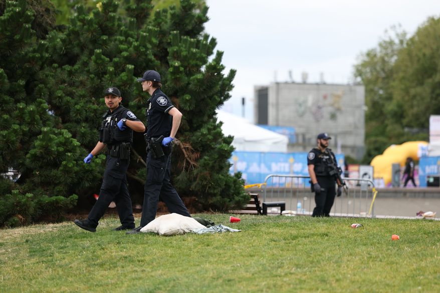 Scene at Seattle Center in Seattle Sunday, July 26, 2026, where a mass shooting has been reported. (Nick Wagner/The Seattle Times via AP)