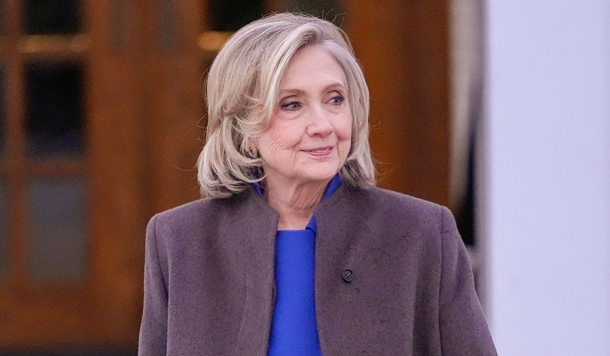 Former Secretary of State Hillary Clinton walks outside the Chappaqua Performing Arts Center, after testifying before U.S. House lawmakers as part of a congressional investigation into convicted sex offender Jeffrey Epstein, Thursday, Feb. 26, 2026, in Chappaqua, N.Y. (AP Photo/Yuki Iwamura, File)