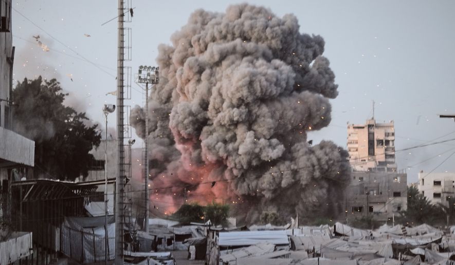 Smoke rises following an Israeli military strike in Gaza City, Tuesday, July 28, 2026. (AP Photo/Jehad Alshrafi)