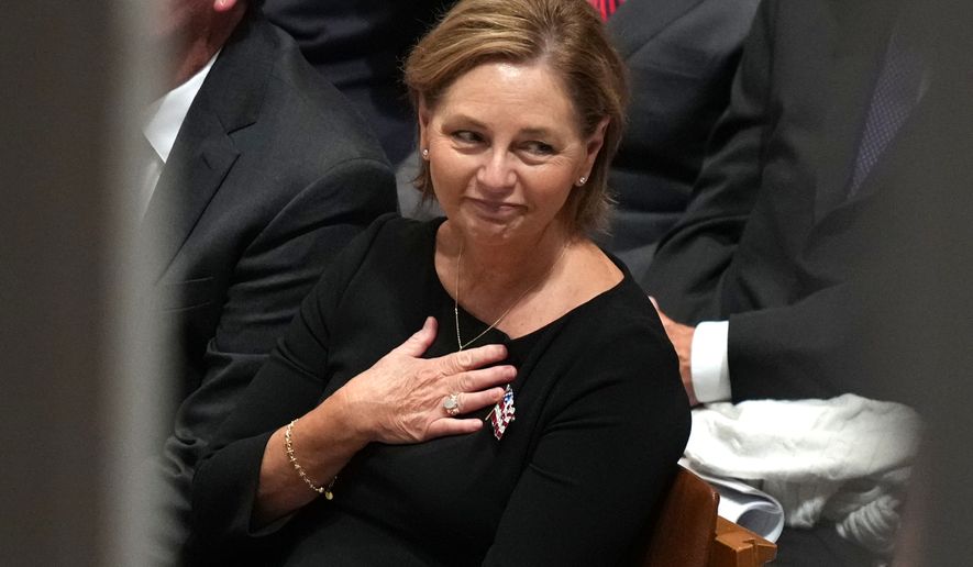 Sen. Darline Graham, R-S.C., gestures during the funeral of her brother, Sen. Lindsey Graham, R-S.C., at the Washington National Cathedral, Tuesday, July 28, 2026, in Washington. (AP Photo/Alex Brandon)