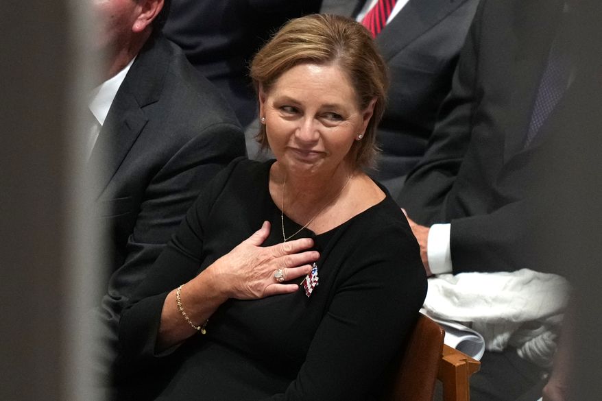 Sen. Darline Graham, R-S.C., gestures during the funeral of her brother, Sen. Lindsey Graham, R-S.C., at the Washington National Cathedral, Tuesday, July 28, 2026, in Washington. (AP Photo/Alex Brandon)