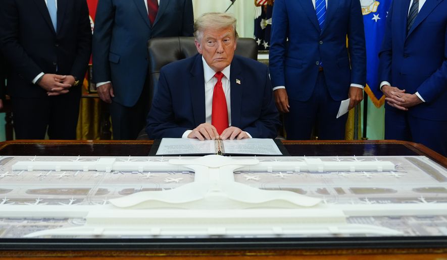 President Donald Trump speaks in the Oval Office of the White House about Dulles International Airport modernization, Wednesday, July 29, 2026, in Washington. (AP Photo/Julia Demaree Nikhinson)