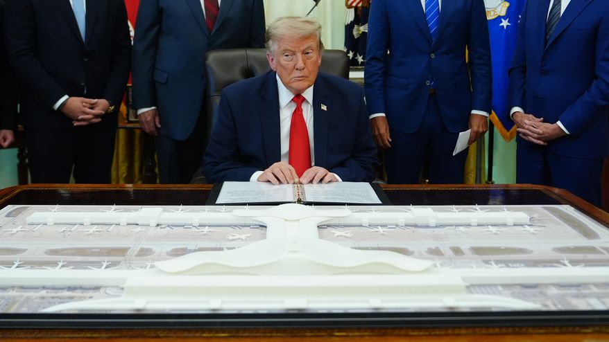 President Donald Trump speaks in the Oval Office of the White House about Dulles International Airport modernization, Wednesday, July 29, 2026, in Washington. (AP Photo/Julia Demaree Nikhinson)