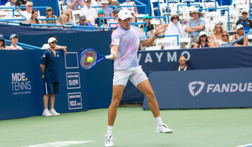 Alex de Minaur of Australia returns a ball in his first round match against Stefanos Tsitsipas of Greece at the DC Open tennis tournament in Washington, D.C., Wednesday, July 29, 2026. (All-Pro Reels)