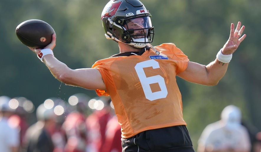 Tampa Bay Buccaneers quarterback Baker Mayfield throws a pass during an NFL football training camp practice Wednesday, July 29, 2026, in Tampa, Fla. (AP Photo/Chris O'Meara)