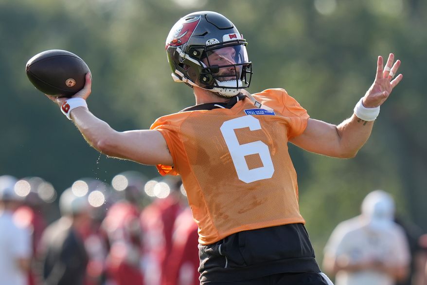 Tampa Bay Buccaneers quarterback Baker Mayfield throws a pass during an NFL football training camp practice Wednesday, July 29, 2026, in Tampa, Fla. (AP Photo/Chris O'Meara)