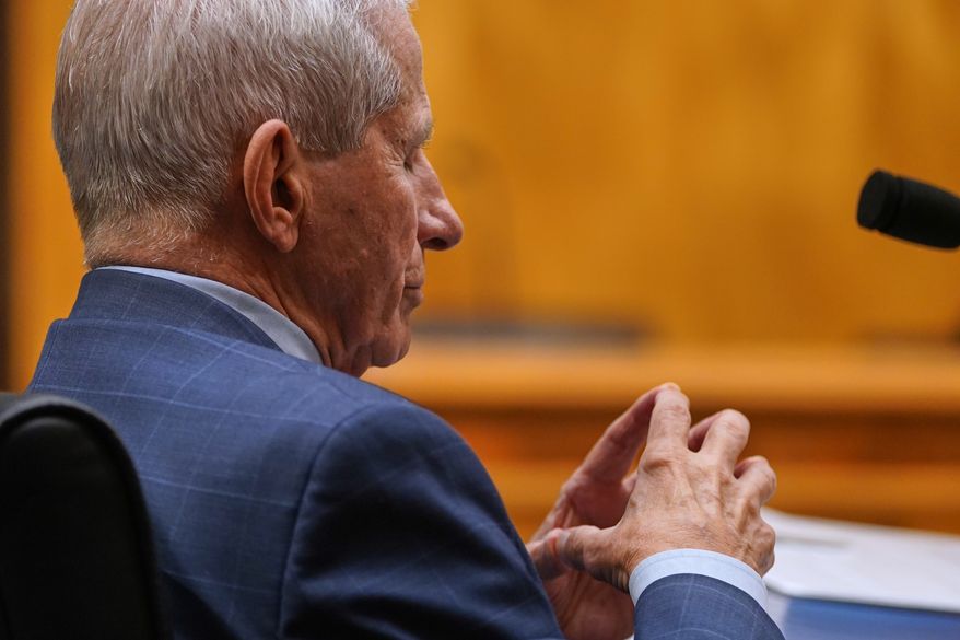Dr. Anthony Fauci listens as he appears before the Senate Homeland Security and Governmental Affairs Committee at the Capitol, Wednesday, July 29, 2026, in Washington. (AP Photo/Allison Robbert)