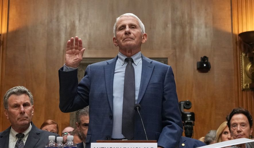 Dr. Anthony Fauci is sworn in before the Senate Homeland Security and Governmental Affairs Committee at the Capitol, Wednesday, July 29, 2026, in Washington. (AP Photo/Allison Robbert)