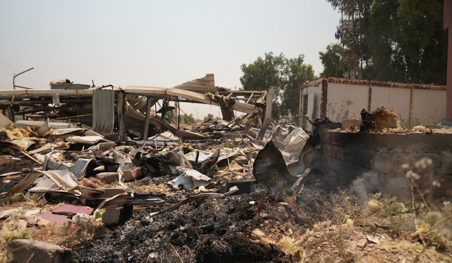 Damaged structures at the site of an airstrike on a Popular Mobilization Forces base in Mosul, Iraq, Wednesday, July 29, 2026. (AP Photo/Farid Abdulwahed)