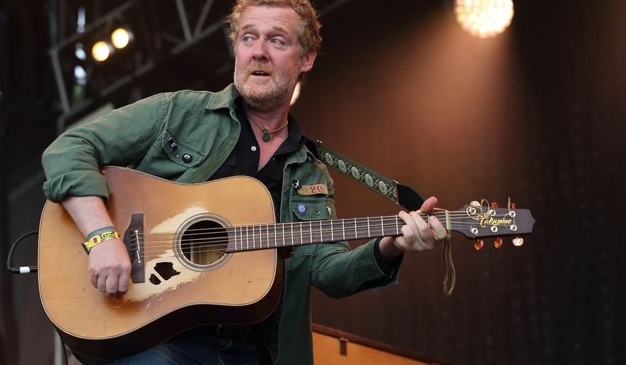 FILE - Glen Hansard performs at Lollapalooza in Chicago's Grant Park on Sunday, Aug. 3, 2014. (Photo by Steve C. Mitchell/Invision/AP, File)