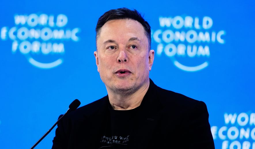 Elon Musk attends the annual meeting of the World Economic Forum in Davos, Switzerland, Jan. 22, 2026. (AP Photo/Markus Schreiber, File)