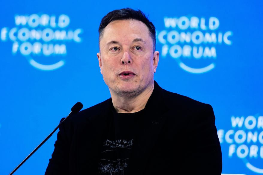 Elon Musk attends the annual meeting of the World Economic Forum in Davos, Switzerland, Jan. 22, 2026. (AP Photo/Markus Schreiber, File)