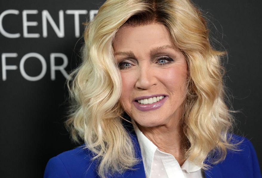 Donna Mills poses at the premiere of the documentary film "Bob Mackie: Naked Illusion" at the Directors Guild of America, Monday, May 13, 2024, in Los Angeles. (AP Photo/Chris Pizzello)
