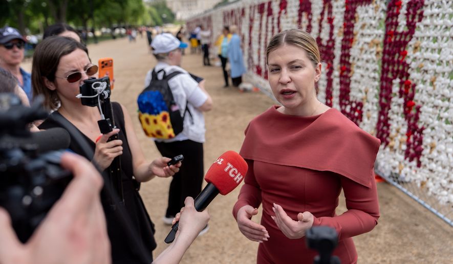 Ukraine's Ambassador to the United States Olha Stefanishyna speaks with media as thousands of teddy bears representing children deported from Ukraine by Russia since the start of its invasion in 2022 are displayed on the National Mall in Washington on Thursday, April 23, 2026. (AP Photo/Julia Demaree Nikhinson) **FILE**