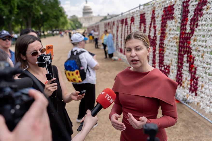 Ukraine's Ambassador to the United States Olha Stefanishyna speaks with media as thousands of teddy bears representing children deported from Ukraine by Russia since the start of its invasion in 2022 are displayed on the National Mall in Washington on Thursday, April 23, 2026. (AP Photo/Julia Demaree Nikhinson) **FILE**