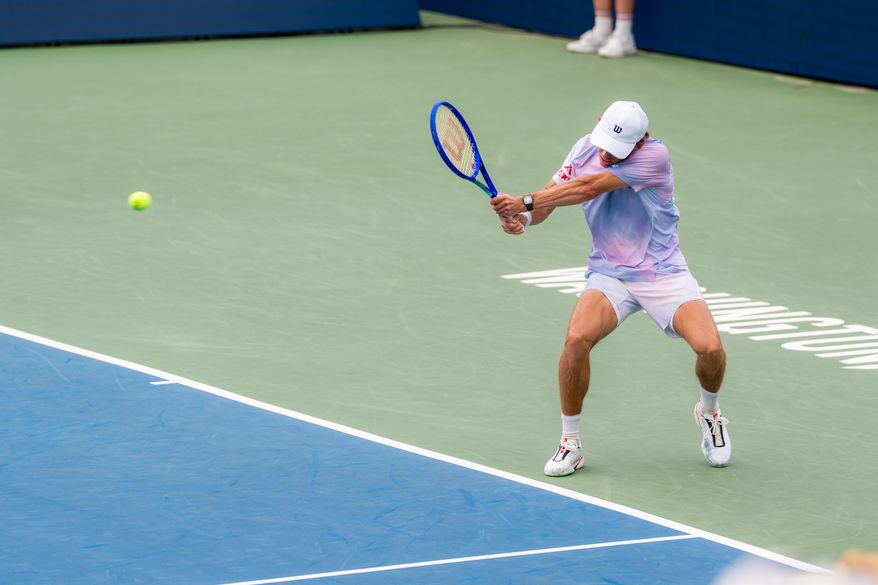 Alex de Minaur of Australia returns a ball against Cruz Hewitt of Australia in a second round match at the DC Open tennis tournament in Washington, D.C., Thursday, July 30, 2026. (All-Pro Reels)