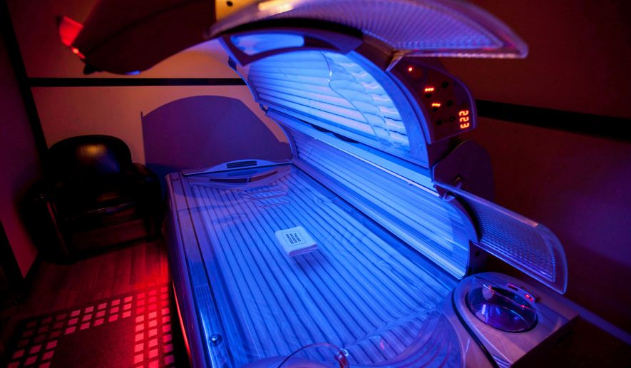 FILE - A tanning bed is seen on March, 20, 2012, in North Vancouver, Canada. (Jonathan Hayward/The Canadian Press via AP)