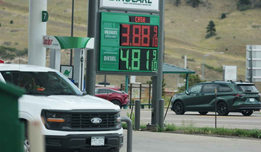 Gas prices are displayed at a Sinclair gas station along Interstate 70, Thursday, July 23, 2026, in Golden, Colo. (AP Photo/David Zalubowski)