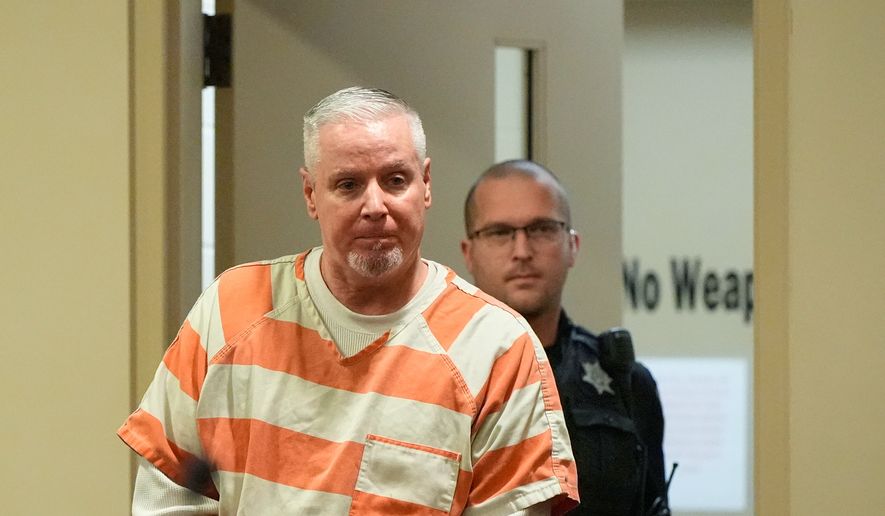 Colin Gray, the father of Apalachee High School shooting suspect Colt Gray, arrives at the courtroom at the Barrow County courthouse, Dec. 18, 2025, in Winder, Ga. (AP Photo/Brynn Anderson, File)