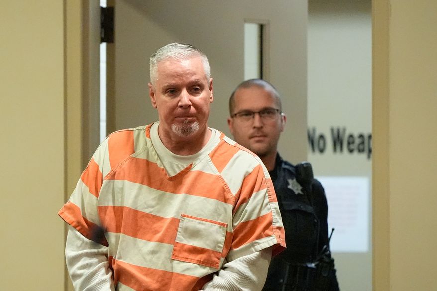 Colin Gray, the father of Apalachee High School shooting suspect Colt Gray, arrives at the courtroom at the Barrow County courthouse, Dec. 18, 2025, in Winder, Ga. (AP Photo/Brynn Anderson, File)