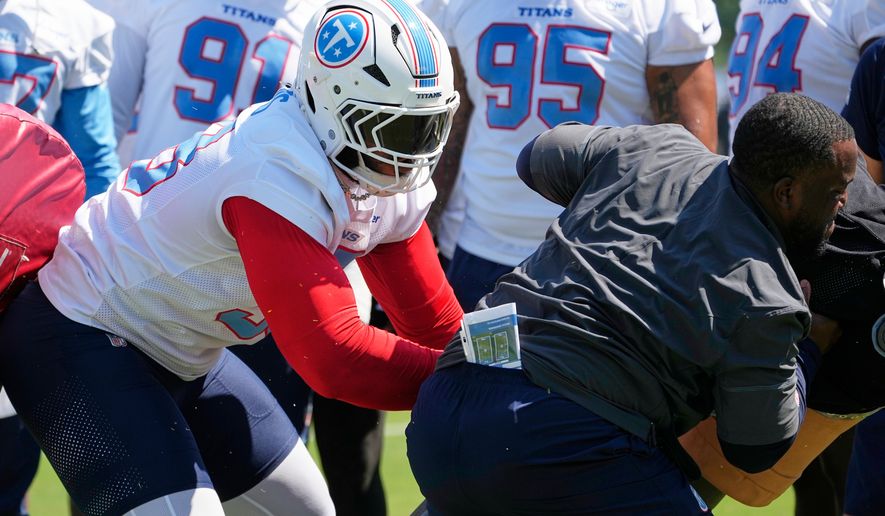 Tennessee Titans defensive tackle Jeffery Simmons runs though a drill during the NFL football team's training camp Thursday, July 30, 2026, in Nashville, Tenn. (AP Photo/George Walker IV)