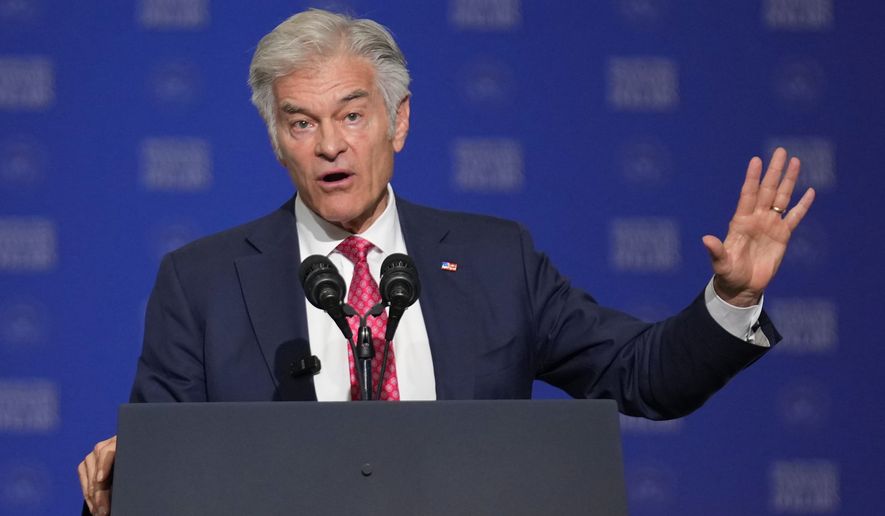 Centers for Medicare & Medicaid Services administrator Dr. Mehmet Oz speaks before Vice President JD Vance at the Wisconsin Air National Guard facility at Milwaukee Mitchell International Airport, Wednesday, July 8, 2026, in Milwaukee. (AP Photo/Mark Schiefelbein, Pool)